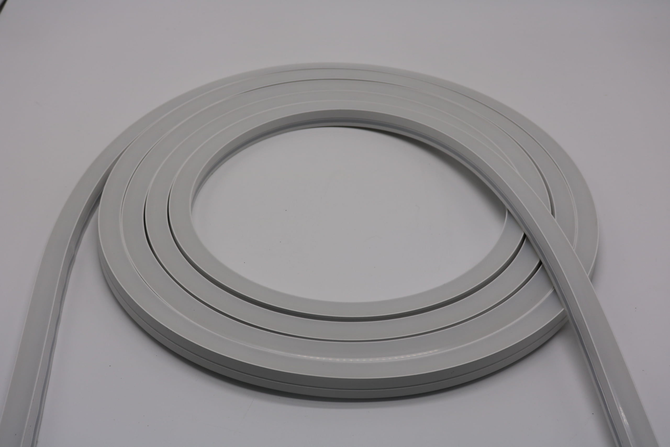 LED strip installation process showing smooth threading LED strip installation in silicone diffuser