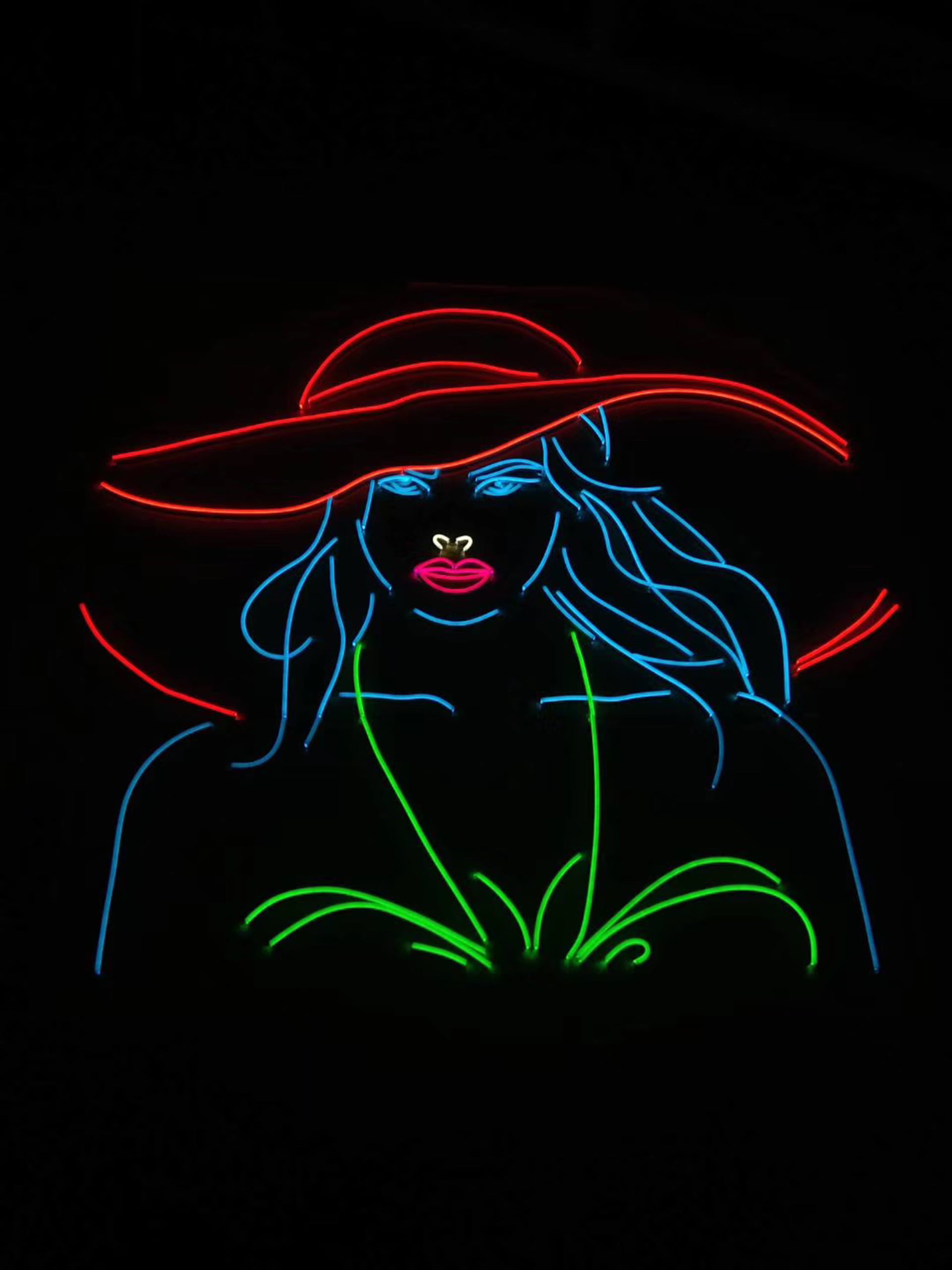 Engineers testing LED neon flex in a lab