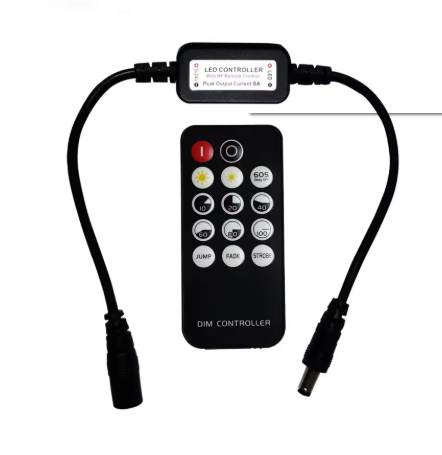 Black LED dimmer controller connected to a remote control featuring multiple buttons for light adjustments.