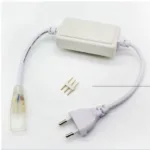 Set of silicone neon flex lighting accessories including power cord with plug, adapter, and gold connectors on white background.