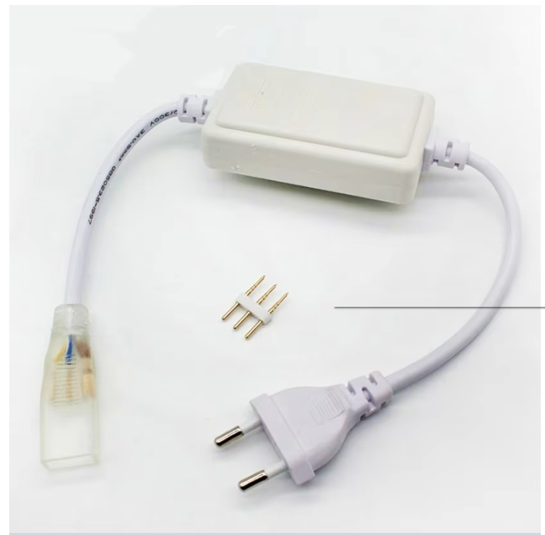 Set of silicone neon flex lighting accessories including power cord with plug, adapter, and gold connectors on white background.