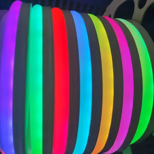 Close-up of multicolor silicone neon flex lighting rolls in vibrant shades of purple, green, red, blue, and yellow.